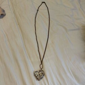 Necklace with extra long chain
Beautiful heart